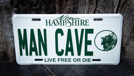 new hampshire license plate with man cave inscription